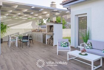 The outdoor dining area of Villa Salvela