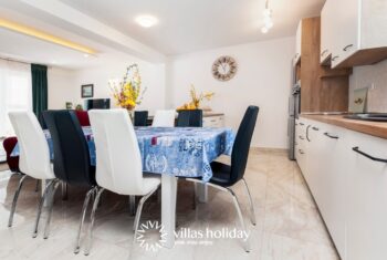 Kitchen and dining are of Villa Nina